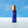 Augustinus Bader The Face Mist (100 ml) - product shown on table with water drops