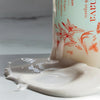 Frenava Cleansing Cream - Closeup of product smear with bottle