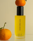 Orchid + Ash Daydream All-Natural Body Oil - Orange + Neroli - product shown with oranges