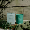 Kerzon Fragranced Candle - Fleur de Romarin (190 g) - product shown next to packaging on a cutting board. 