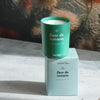 Kerzon Fragranced Candle - Fleur de Romarin (190 g) - product shown stacked on top of packaging. 