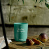Kerzon Fragranced Candle - Feuilles de Figuier (190 g) - product shown with figs. 