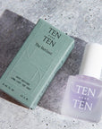 Tenoverten The Outlast Top Coat - product shown next to packaging on concrete