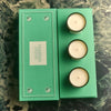 Lifestyel shot of Flamingo Estate Organics - Mini Three Sisters Candle Set (3 x 96 g) shown with top of box off showing candles inside