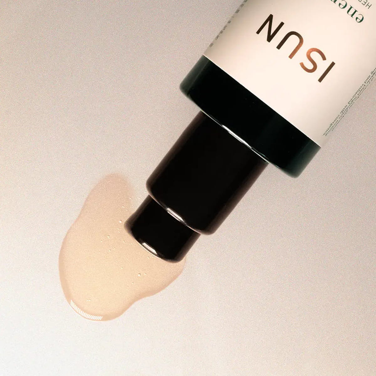 Close up of ISUN Energize Herbal Body Oil (100 ml) showing product swatch