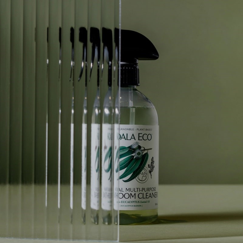 Koala Eco Natural Multipurpose Bathroom Cleaner - Abstract shot on green background