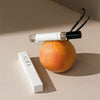 Orchid + Ash Aura Travel Spray - Grapefruit + Tonka Bean - Product shown with fruit