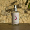 La Selva Positano Orange Blossom Hydrolate - product shown on stone table in front of stone wall