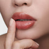 Augustinus Bader The Tinted Lip Balm - Shade 2 - close up of models lips