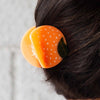 Jenny Lemons Orange Hair Claw - close up of product in models hair