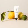 Essential Parfums Hand Cream - Nice Bergamote - product with citrus fruit in the background