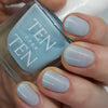 Tenoverten Nail Polish - Riverside - model holding product with nail polish on