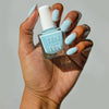 Tenoverten Nail Polish - Riverside - model holding product
