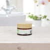 Oliflora L'immortelle Creme - product shown on table in bathroom
