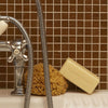 Carriere Freres Solid Body Soap - Apotheca - product shown next to sponge on bathtub