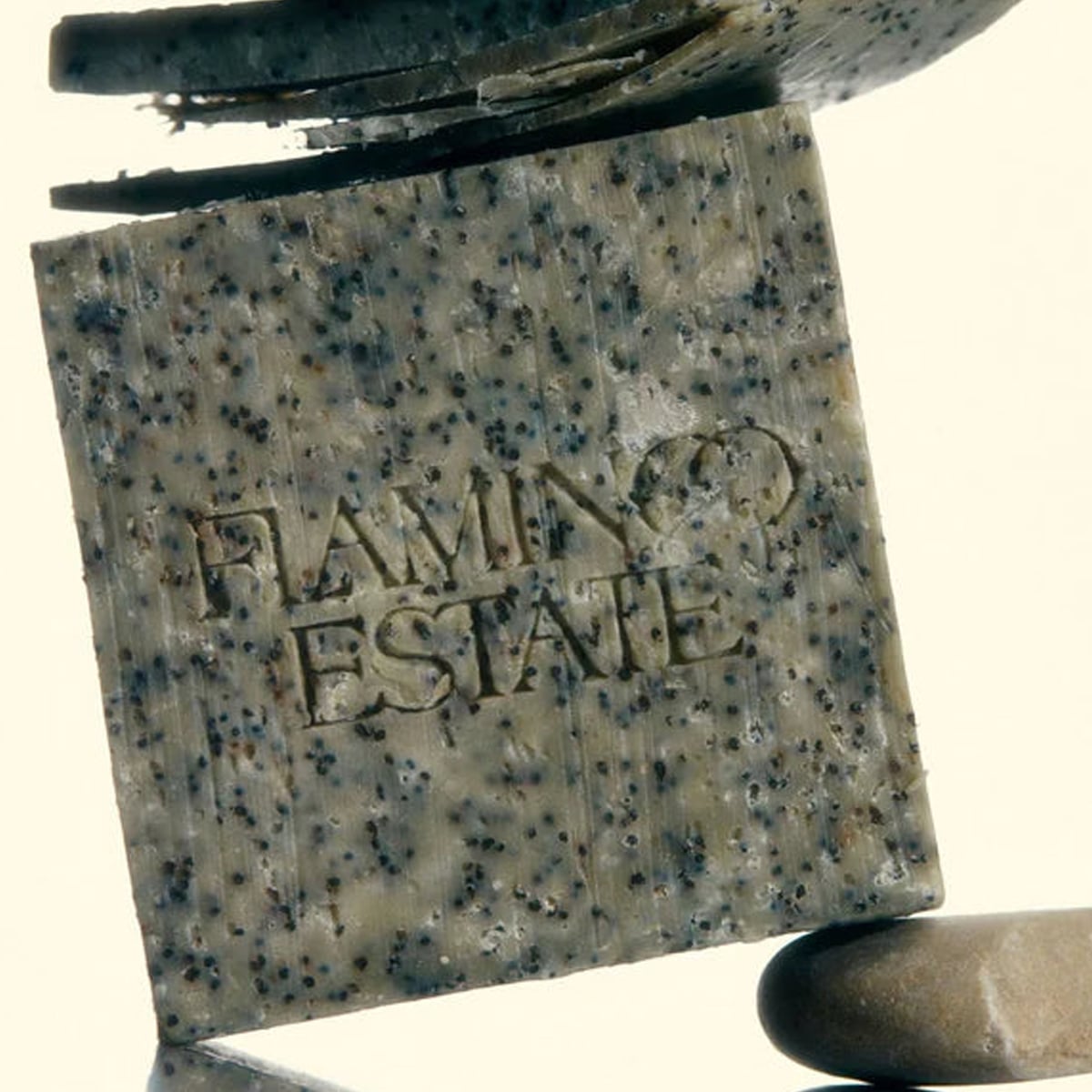 Flamingo Estate Organics Exfoliating Peppermint Soap Brick (340 g) - product shown on creme background. 