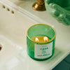 ROEN Candles Casa Polanco Scented Candle - product shown lit and on sink