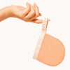 Folia Body Exfoliating Face Mitt - model shown holding product