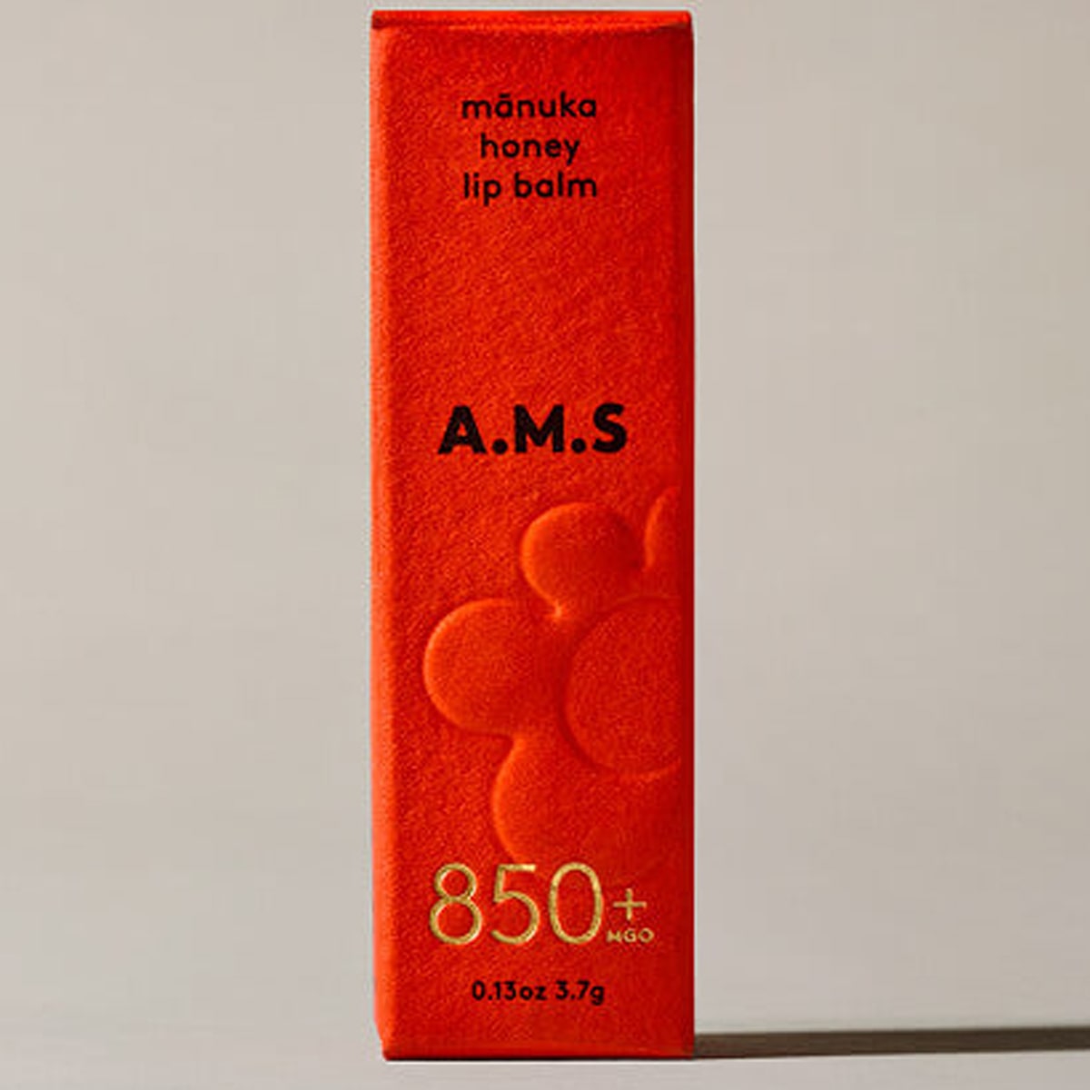 Activist A.M.S Manuka Honey Lip Balm (0.13 oz) - product packaging shown. 