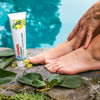 GEHWOL Foot Care Leg Vitality - product shown in front of pool with models foot and hand