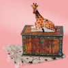 Camp Hollow Giraffe Cake Topper - product shown on top of packaging and bag