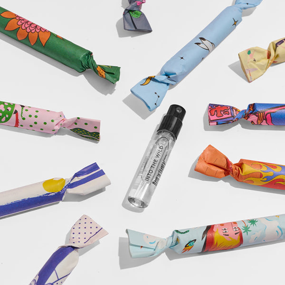 Maison Matine Discovery Set (11 x 2 ml) showing wrapped vials in packaging and one unwrapped vial