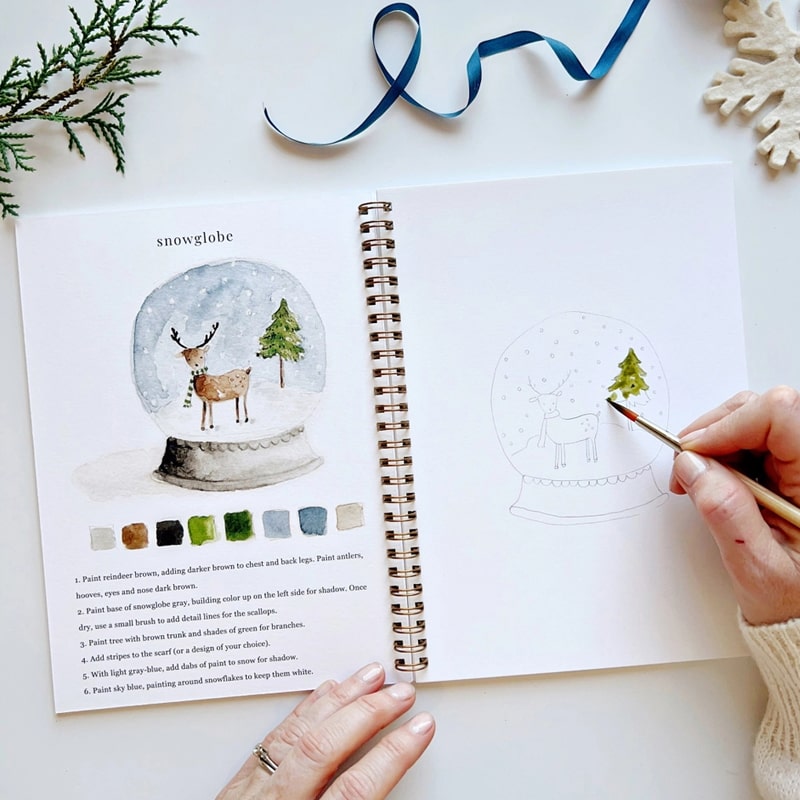 Emily Lex Studio Winter Watercolor Workbook (1 pc) -model shown painting inside product