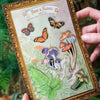 Close up of model holding Moth & Myth Ferns & Friends Psychedelic Mini Set (7 pcs)