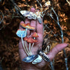 Moth & Myth Forage Moth & Mushroom Set (3 pcs) shown in palm of model's hand