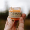 Smithereen Farm Bixa Fixa Healing Salve - model holding product