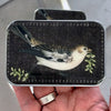 Firefly Notes Birdsong Tin - Large - model shown holding product