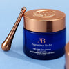 Augustinus Bader The Rich Eye Cream (15 ml) - product shown next to included applicator