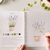 Emily Lex Studio Garden Watercolor Workbook - model shown painting inside product