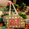 Mathilde Cabanas Vichy Market Tote - model shown holding product over market vegetables
