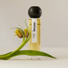 Hima Jomo Spring In Bome Eau de Parfum - product shown with flower