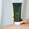 Bamford Geranium Shower Cream - model shown holding product