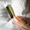 Bamford B Silent Night Time Pillow Mist - models hand shown next to product on linens