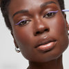 Kosas Soulgazer Eyeliner - Mesmerize - model shown applying product to eyes
