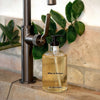 Miller et Bertaux Liquid Soap - In The Garden - product shown on sink with plant