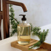 Miller et Bertaux Liquid Soap - In The Temple - product shown on sink with pine branch