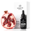 Odacite 15% Vitamin C Intensive Serum - An Autumn on the World - product and packaging shown next to pomegranate 