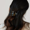 France Luxe Classic Cutout Oval Slide - Africa - model shown wearing product in hair