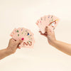 Carolyn Suzuki Goods Playing Cards - models shown holding products