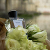 ALTAIA Woo(e)d Eau de Parfum - product shown with flowers