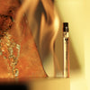 ALTAIA Woo(e)d Eau de Parfum (10 ml) - product shown near flames