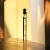 ALTAIA Woo(e)d Eau de Parfum (10 ml) - product shown in warm light