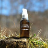 Susanne Kaufmann Nutrient Serum - product shown on rock near grass
