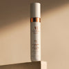 Augustinus Bader The Mineral Sunscreen SPF 50 (30 ml) - product shown on top of stone