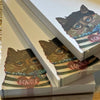 Carpe Diem Papers Bonjour Chat Le Petit Notepad - close up of three products stacked