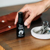 Ofa Karri Daily Defense Immunity Spray - model shown holding product by keys